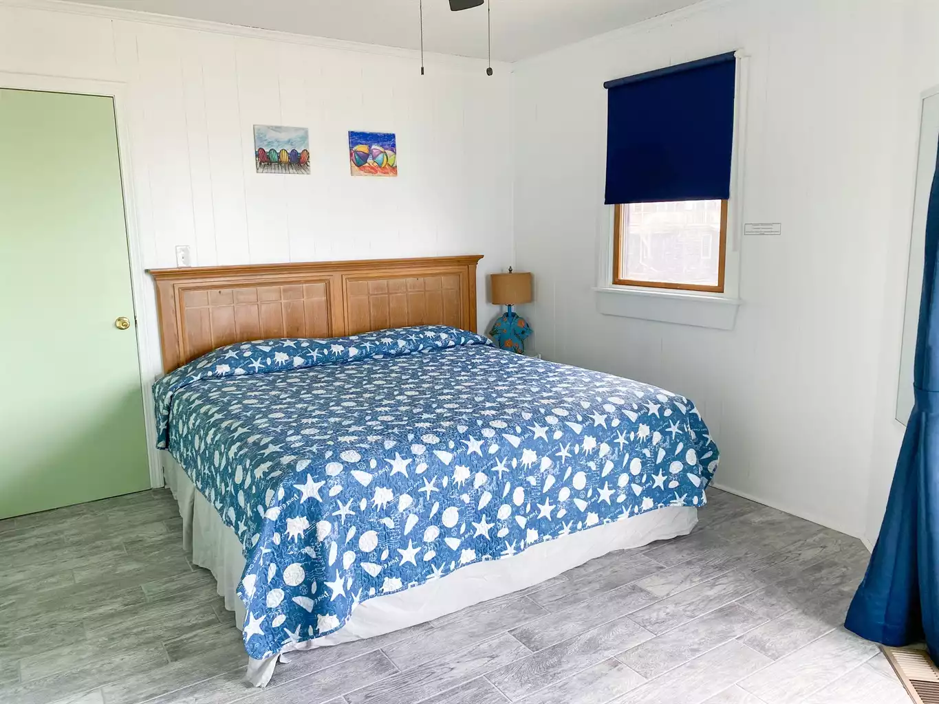 Downstairs Master 1 - King bed with TV. Sliding door to oceanfront deck. Downstairs Master 1 - King bed with TV. Sliding door to oceanfront deck. - Ye Scurvy Sea Dog - Nags Head
