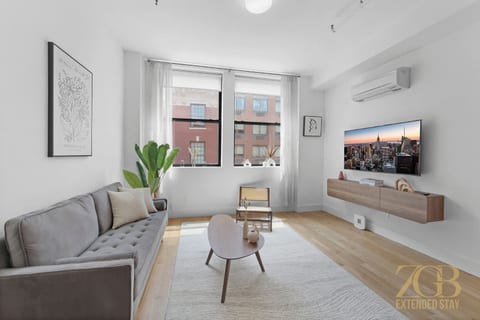 Modern 1BR in Prime Manhattan w/Laundry & Elevator