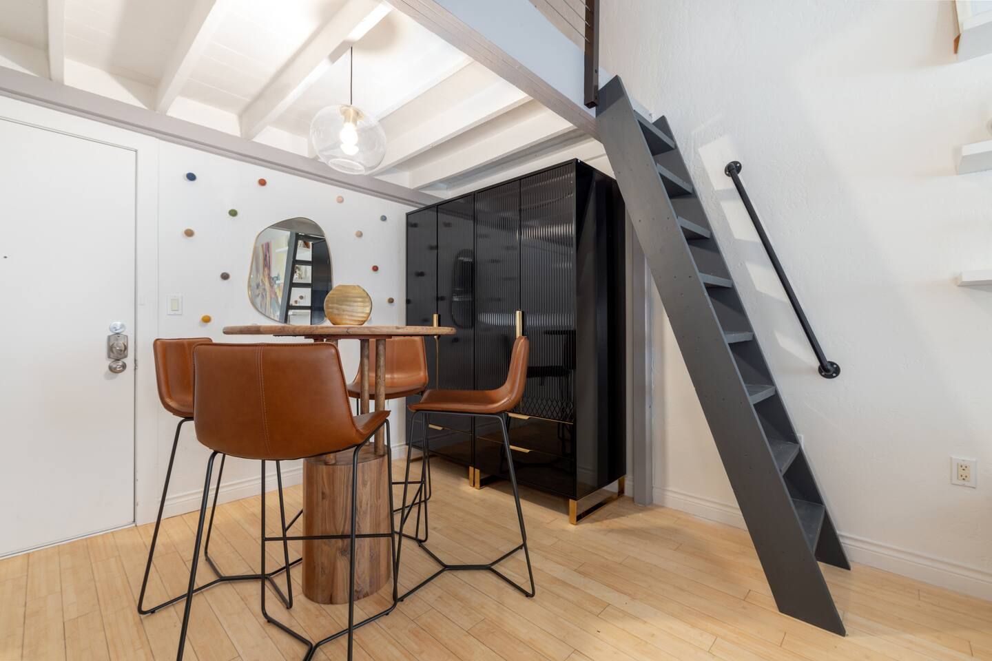 Ladder leading to loft sleeping area.