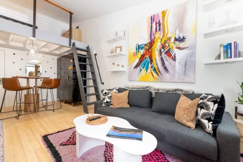 Open concept living room making our small 350 sqft studio feel spacious.