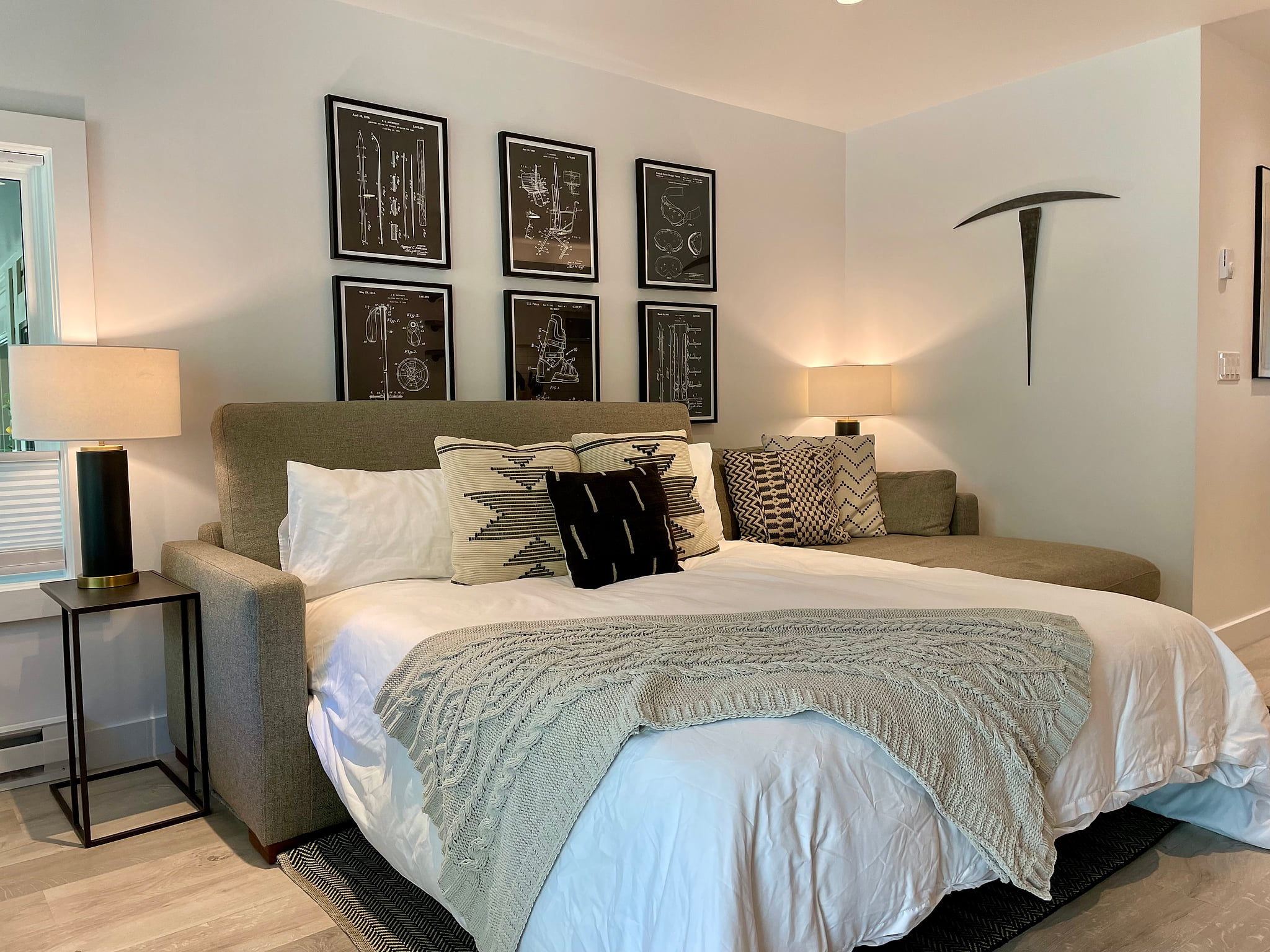 Cozy queen sized pullout couch bed in living room.