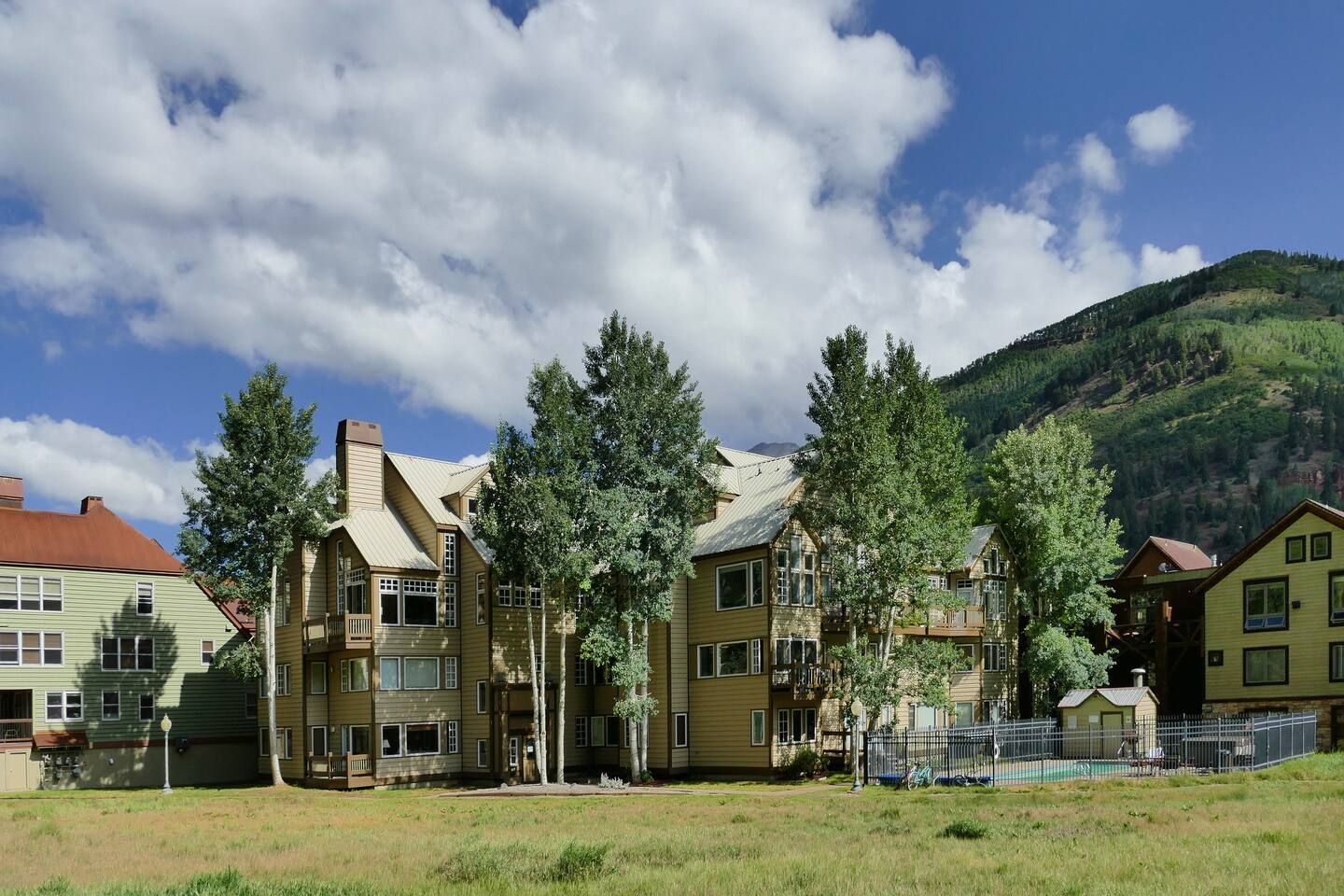 Back of building and pool area, view from ski lift looking at property.