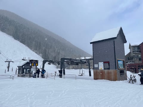 Ski-in/ski-out access with chairlift views and a snowy alpine setting