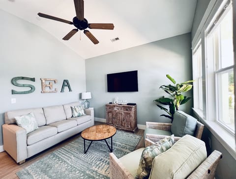 Unwind and get cozy in the heart of your home: the perfect living room.