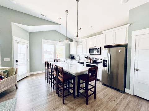 Your culinary canvas: a white-themed kitchen ready for your culinary masterpieces.