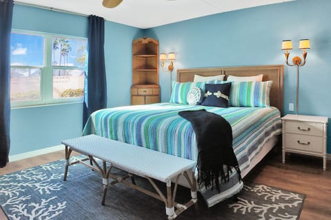 Primary bedroom with king bed and private en-suite bath