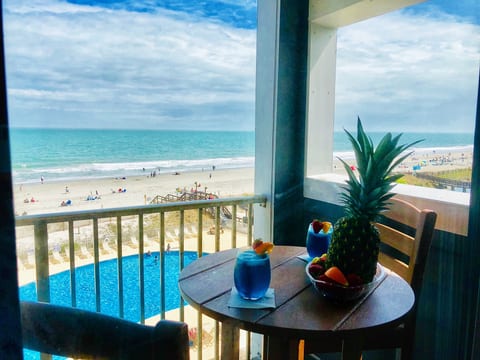 Overlooking the beachfront pool & ocean!