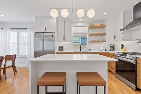 fully stocked kitchen with island seating