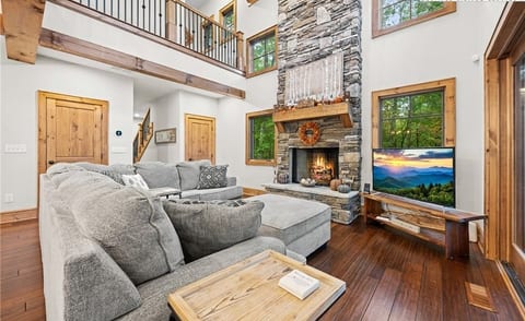 Oversized sectional couch to cozy up on.  Views from every large window to enjoy being outside while inside.  