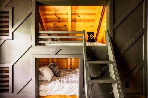 Kids have their own sleeping space, while still in the primary bedroom.