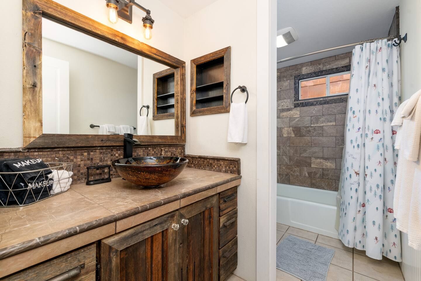 Bathroom with full size tub and shower located on the first floor.