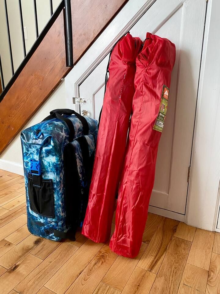 2 chairs to take to the river or park and a cooler backpack 