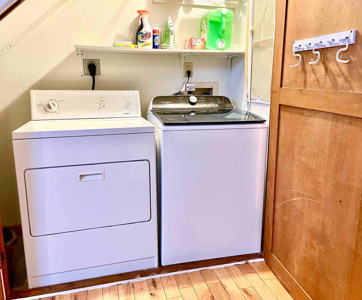 Free washer and dryer in unit located under the stairs