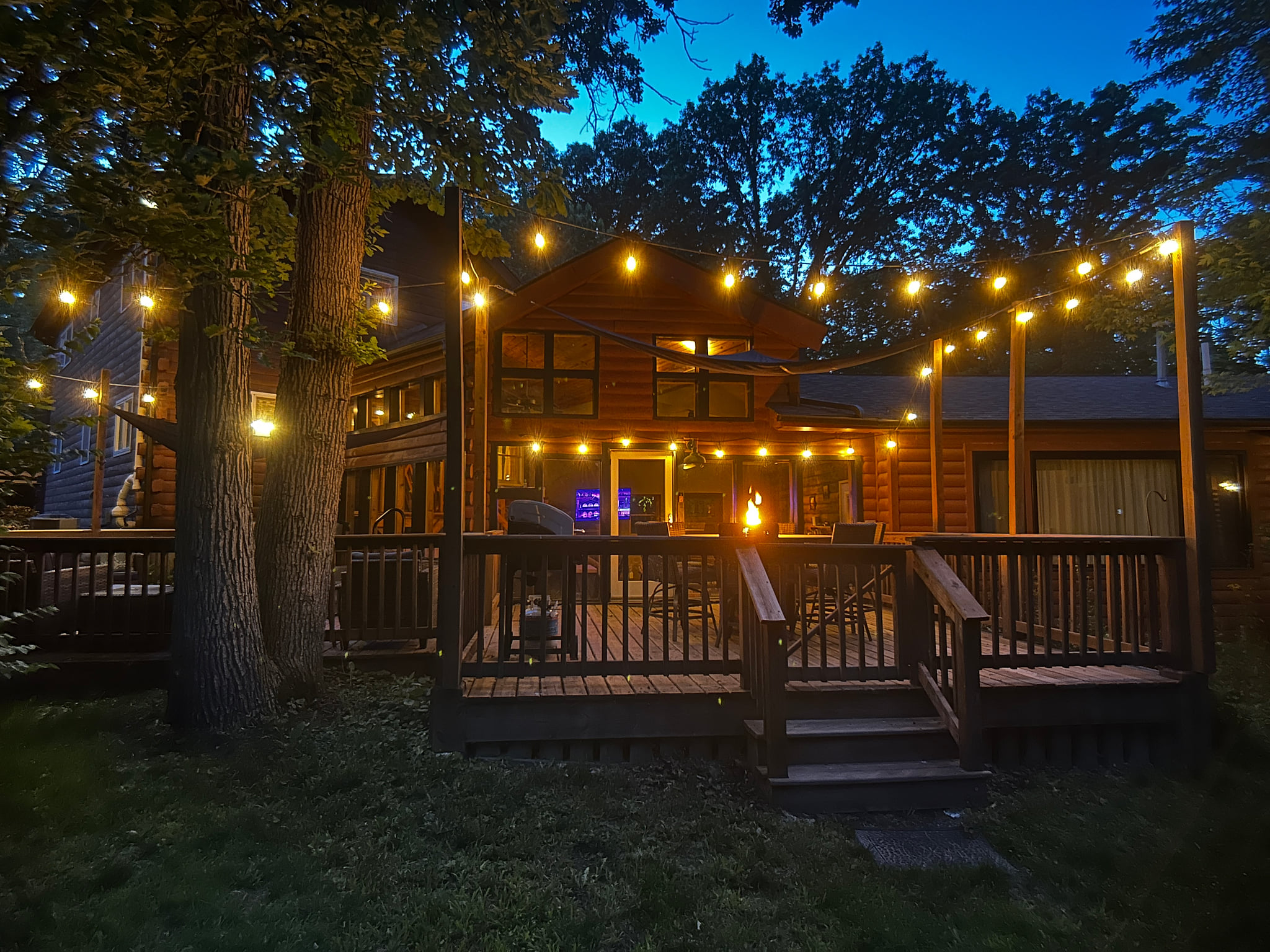 Wind down under the cozy lighting at the end of your day. Relax in the hot tub or gather around the fire table.