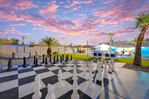 Life-size outdoor chess set in a private, fully fenced backyard
