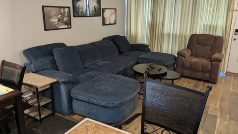 New sectional. Power reclining chaise lounges. Pull out Full bed