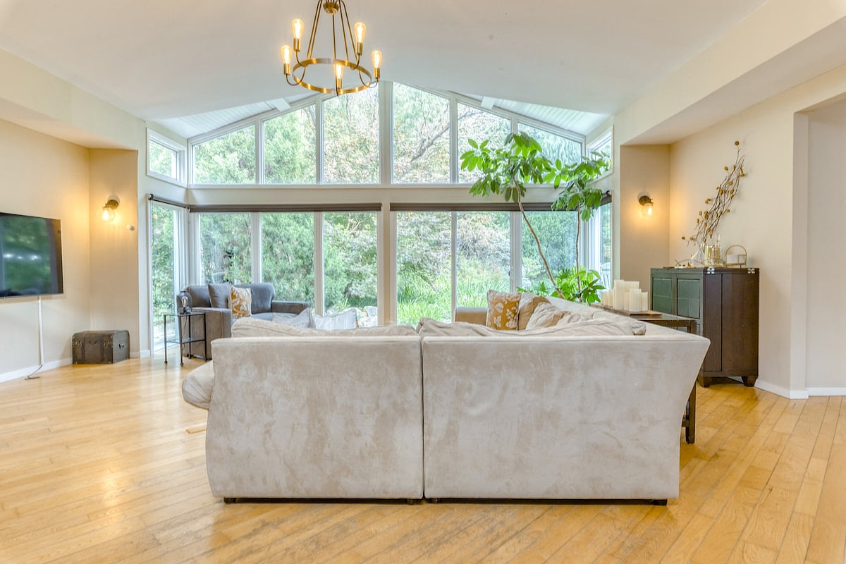 Bring nature inside with floor to (vaulted) ceiling windows 