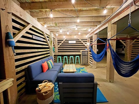 Hangout space with a 2nd outdoor bar and fridge/freezer