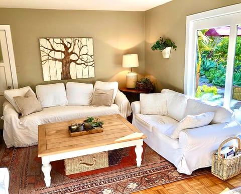 Living room facing the backyard .