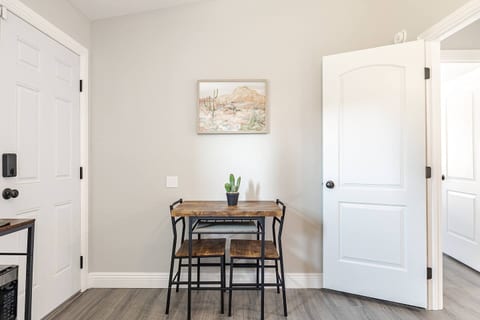 Dining table for two with placemats. 