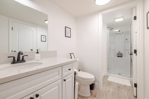 Step into a sparkling clean bathroom, thoughtfully prepared for your comfort. 