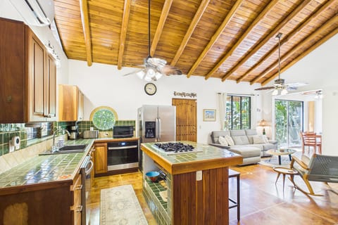 Open Kitchen/ Living Room.  AC in kitchen/living room and all bedrooms.  There is a indoor laundry room with full size washer and dryer off kitchen.  The laundry room has two double doors, food pantry area, and can be used to store/lock valuables.  