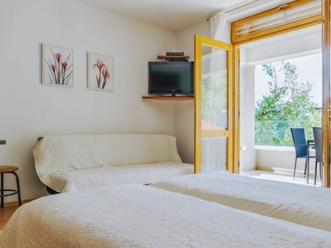 Studio mit Balkon für drei Personen