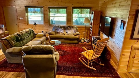 Grandroom has 12’ ceiling height and dining table for 8-10 people.