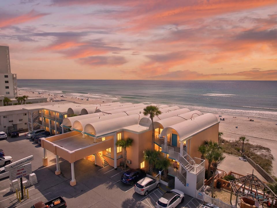 Beachfront condo: sunset Gulf views, balconies, and steps-to-sand access