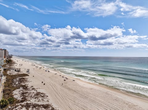 Endless Gulf views over sugar-white sands—steps from the surf.