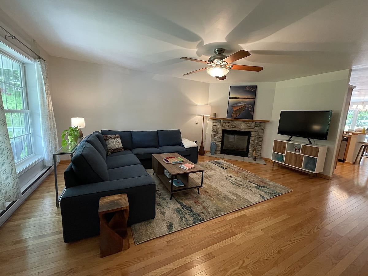 Living Room with propane fireplace A Perfect Getaway: Hot Tub ~ Pinball ~Game Room ~ Pet Friendly ~ Remote Office