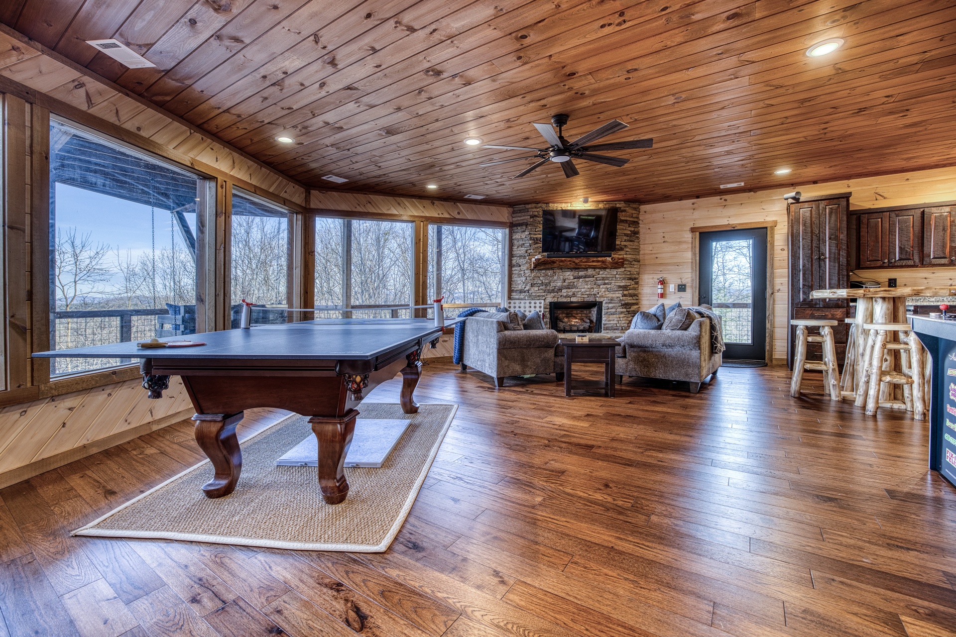 Lower Level Game Room - There is something for everyone in the spacious game room with a second gas fireplace