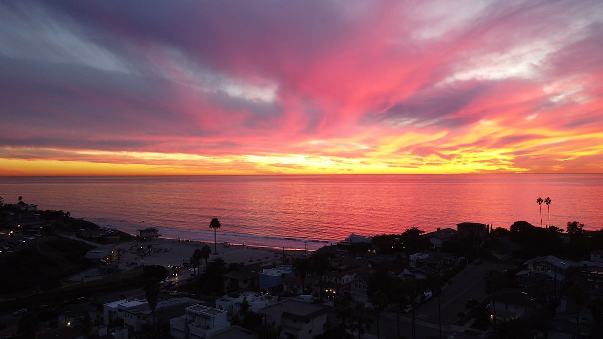 Drone shot from our roof shows just how close we are to Moonlight Beach, a prime location for some epic sunsets.