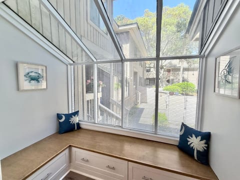 This sunny atrium is perfect for enjoying a cup of coffee, a good book or a board game.