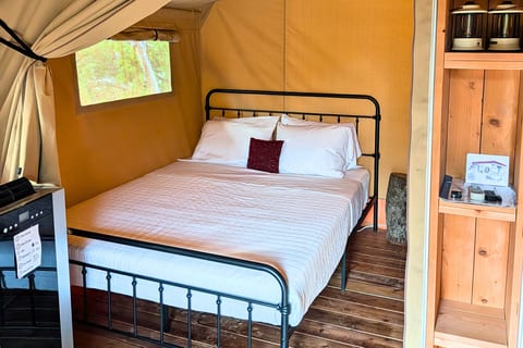 A queen bed to rest after a long day of adventure.