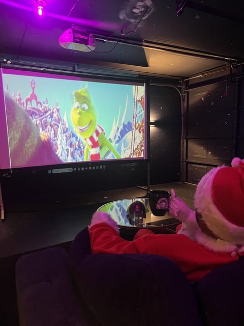Santa Claus loved watching The Grinch in our home movie theatre!