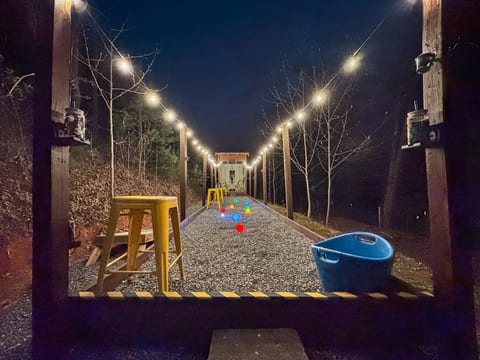 Outdoor Bocce Ball Court: Illuminate your evenings with glow in the dark bocce ball!