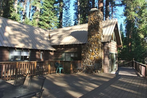 Enjoy this classic mountain cabin with large decks and open yard space. The deck is a great place for outdoor summer meals.