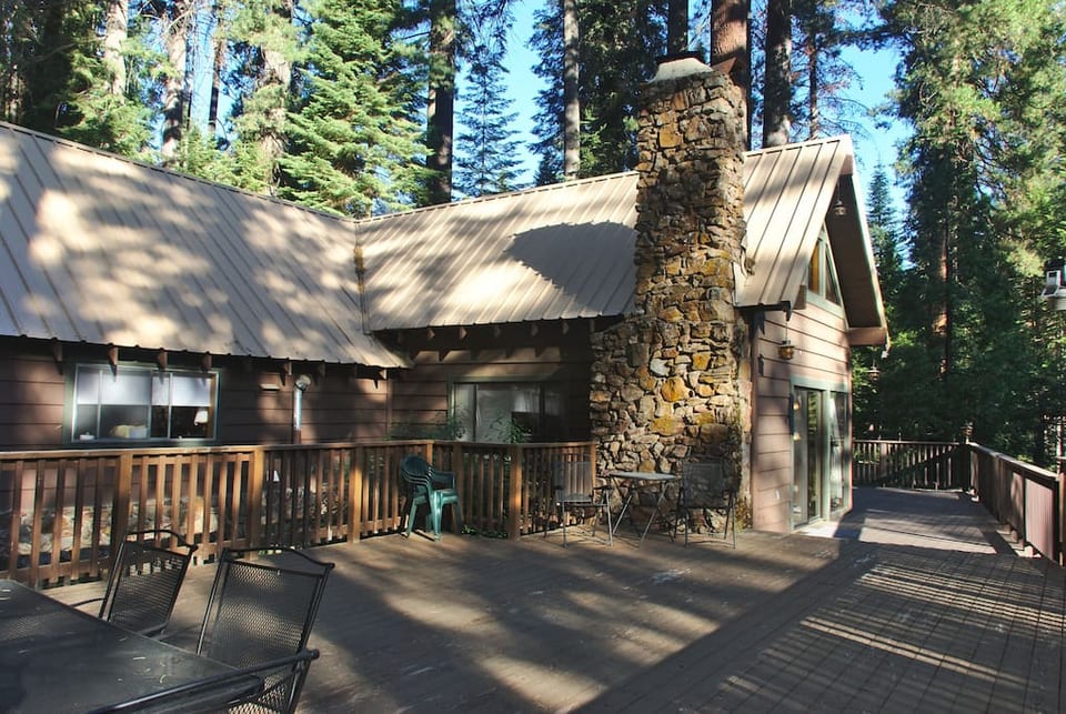 Enjoy this classic mountain cabin with large decks and open yard space. The deck is a great place for outdoor summer meals.