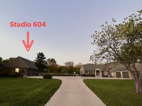 Studio on left, private residence on the right.