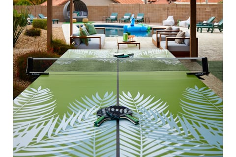 Family bonding playing ping pong