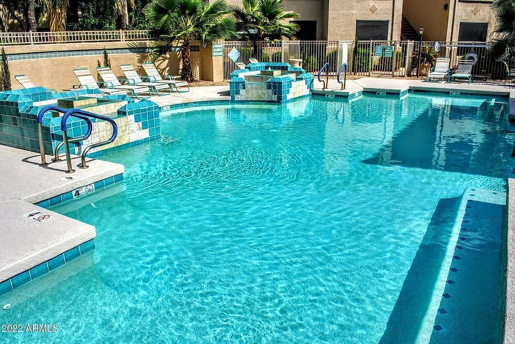 Swim laps in the heated pool