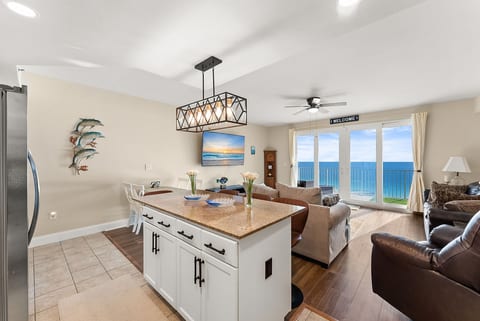 Open kitchen flows seamlessly into the living room, creating a perfect space for gathering and entertaining