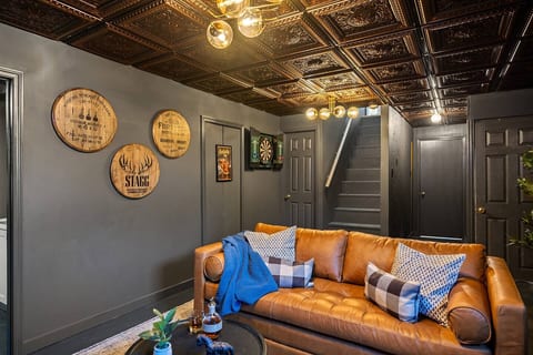 Kick back or turn in—this stylish basement sofa easily transforms into a comfy sleeper.