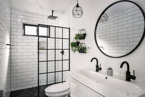 Spacious spa-like shower & waterfall showerhead.  The dual sink makes it easy to get ready together. 

Dimmable LED lights and hexagonal planters accentuate the modern bathroom.