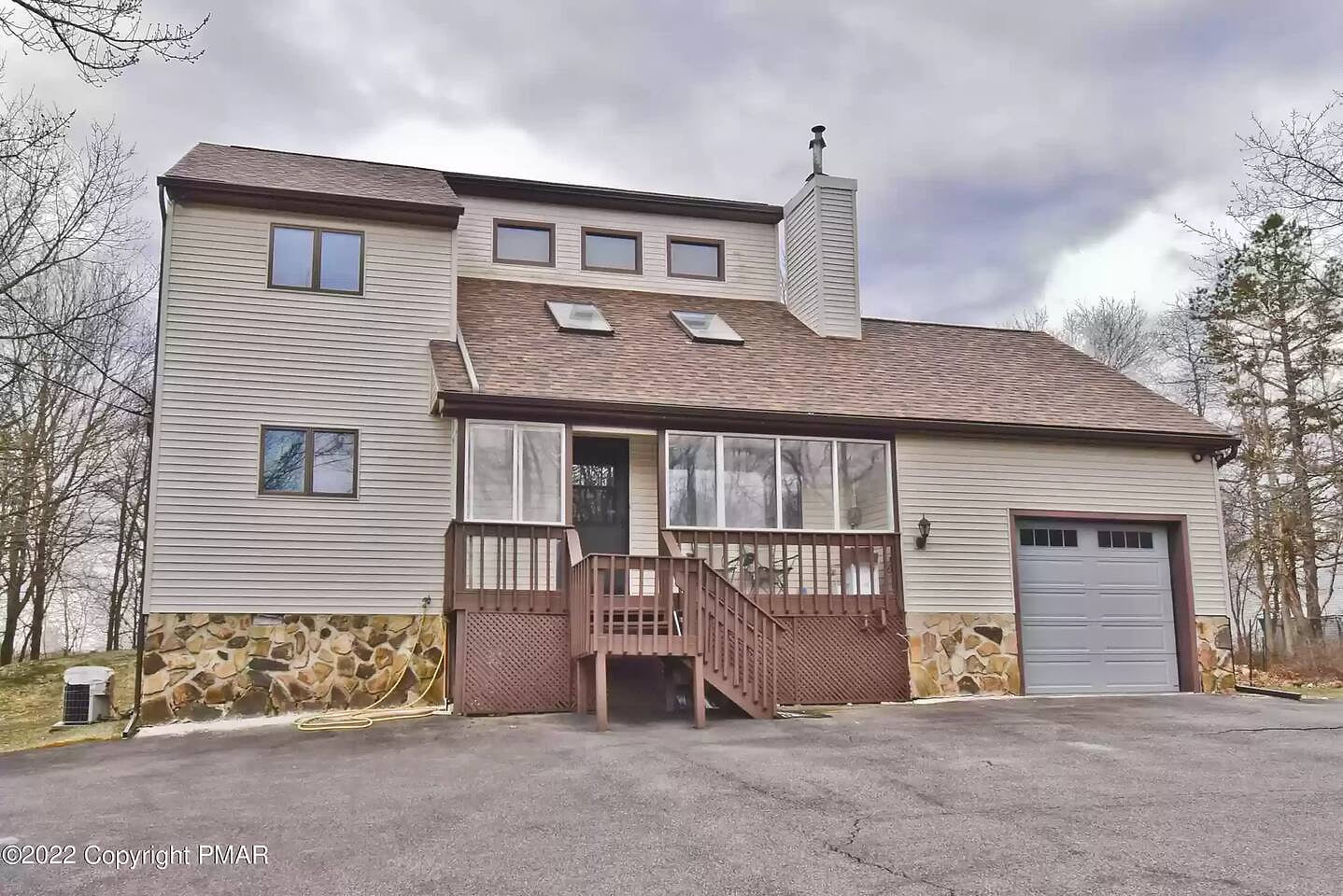 The front of the house is very grand and looks just as big as it is on the inside. Plenty of space plenty of room plenty of parking.