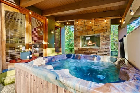 Hot tub overlooking the green pines