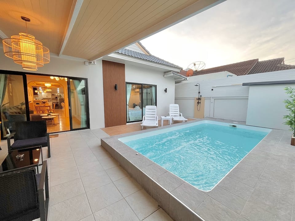 Step directly from your morning coffee to a private dip. This is seamless indoor-outdoor living at its finest—your own quiet sanctuary for sun, swims, and total relaxation.