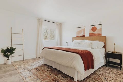 Experience true tranquility in this well-appointed room with a plush queen-size bed, perfect for a couple seeking a romantic escape.