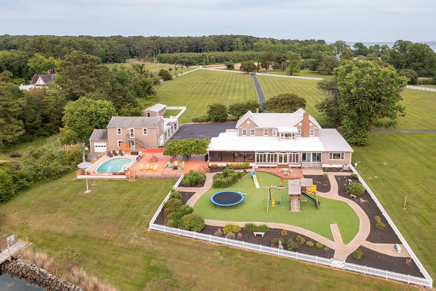 Waterfront retreat with pool, hot tub, private playground, huge yard & scenic views. Perfect for family getaways & special moments—relax, play, and explore the best of the Bay from this unforgettable coastal escape!